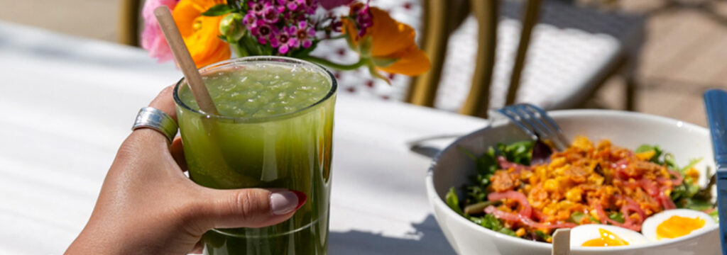 Refreshing iced matcha drink and fresh salad bowl from the LeRouge breakfast & lunch menu.